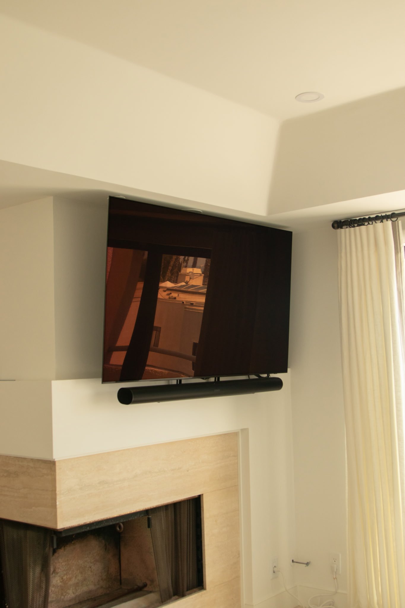 TV mounting above a fireplace